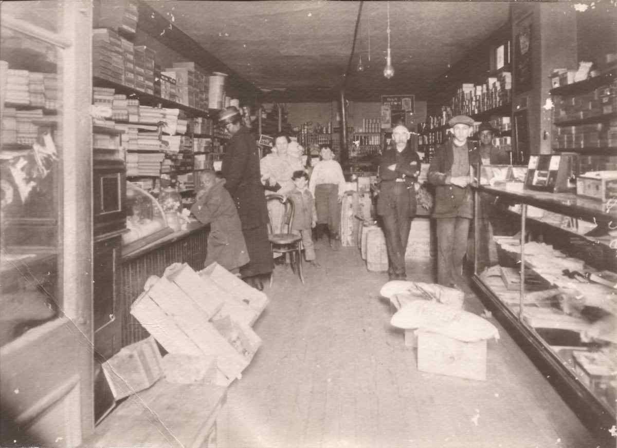 Emma Sachs with her sons and parents in the family store on Main Street Memphis Tennessee